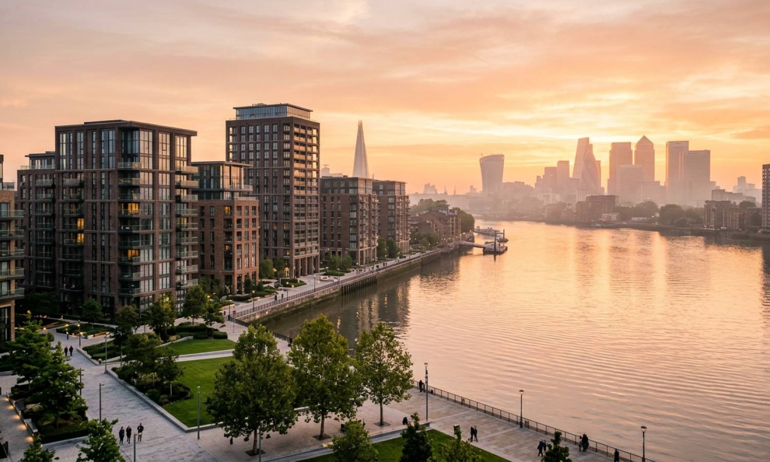 Panoramic view of modern residential new build towers along the River Thames at sunrise illustrating the London property market forecast 2027.